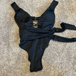 Ashley Graham black one piece swimsuit
